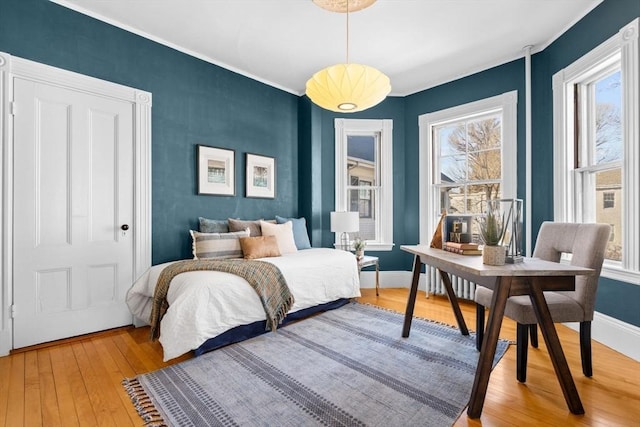 bedroom featuring hardwood / wood-style flooring