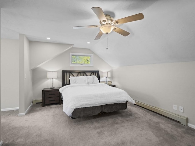 carpeted bedroom featuring baseboards, a ceiling fan, baseboard heating, and vaulted ceiling