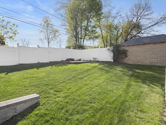 view of yard featuring a fenced backyard