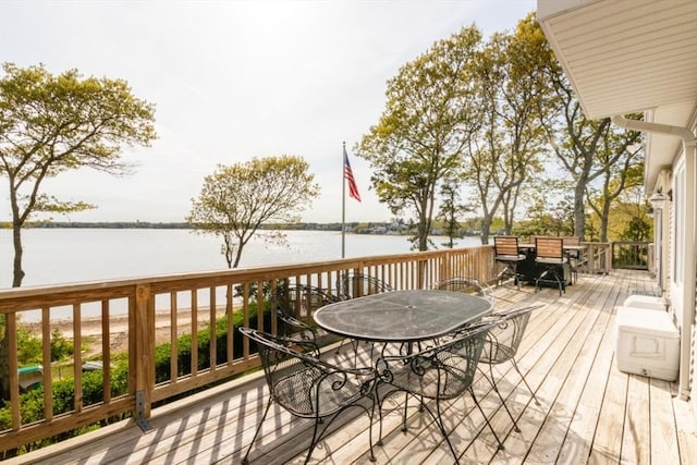 87 Lewis Point Rd, Bourne, MA 02532 - wooden deck with outdoor dining area and a water view