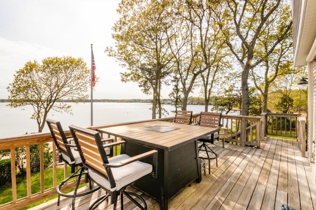 87 Lewis Point Rd, Bourne, MA 02532 - wooden deck featuring outdoor dining space and a water view