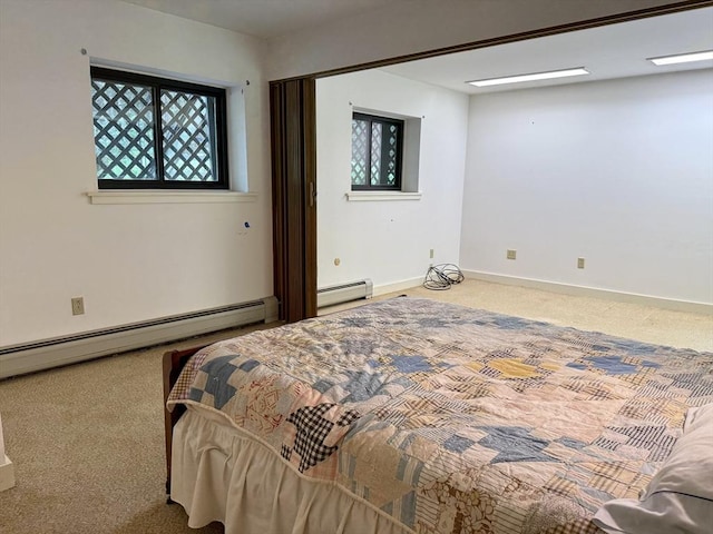1962 Shelburne Falls Rd, Conway, MA 01341 - carpeted bedroom featuring a baseboard radiator and multiple windows