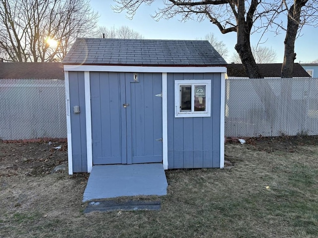 outdoor structure at dusk with a lawn