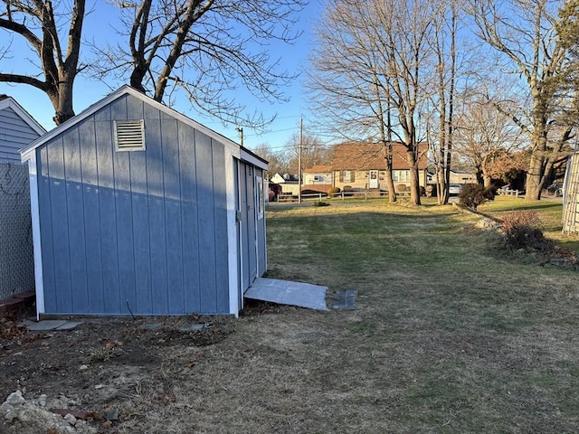 view of outdoor structure with a yard