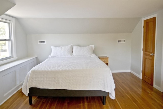 58 Lakeshore Ave, Beverly, MA 01915 - bedroom with vaulted ceiling and wood finished floors