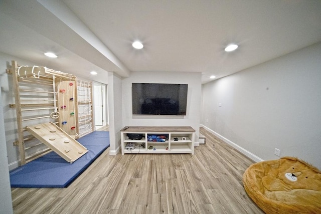 58 Lakeshore Ave, Beverly, MA 01915 - exercise area with wood finished floors and recessed lighting