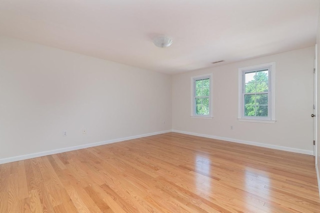 13 Laura Ln, Norton, MA 02766 - spare room featuring light wood-style flooring and baseboards