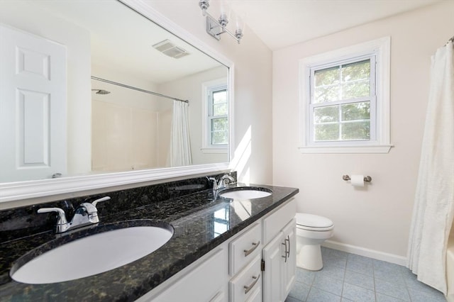 13 Laura Ln, Norton, MA 02766 - full bathroom with plenty of natural light, double vanity, and tile patterned floors
