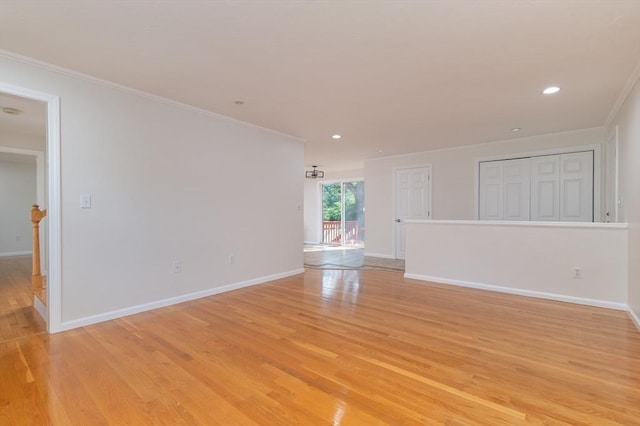 13 Laura Ln, Norton, MA 02766 - unfurnished living room featuring light wood-type flooring, ornamental molding, and recessed lighting