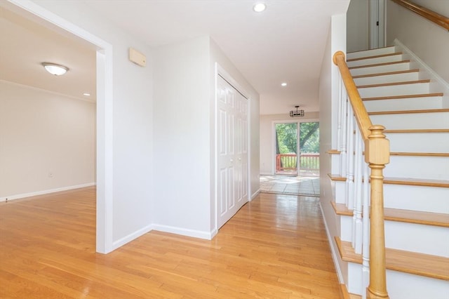 13 Laura Ln, Norton, MA 02766 - hall with light wood-style floors, stairs, and recessed lighting