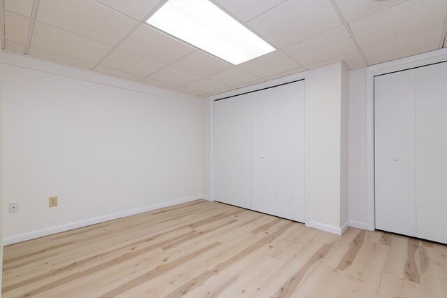 13 Laura Ln, Norton, MA 02766 - unfurnished bedroom featuring a drop ceiling and wood finished floors