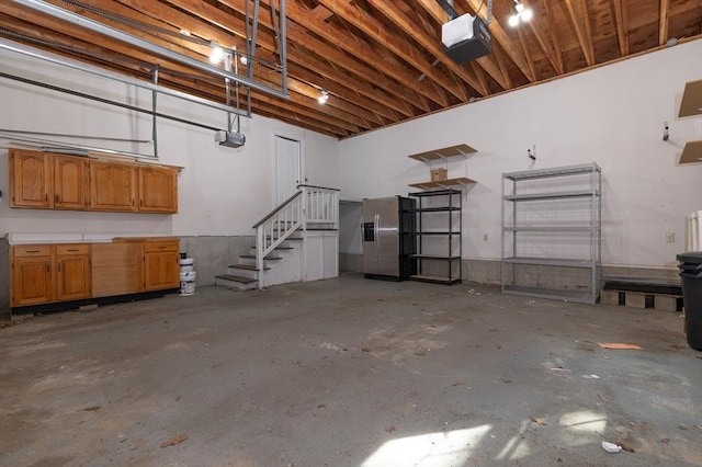 13 Laura Ln, Norton, MA 02766 - garage featuring a garage door opener