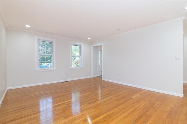 13 Laura Ln, Norton, MA 02766 - spare room featuring crown molding, light wood-style flooring, and recessed lighting