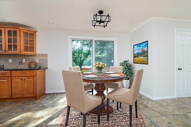 13 Laura Ln, Norton, MA 02766 - dining space featuring ornamental molding, recessed lighting, and light stone finish flooring