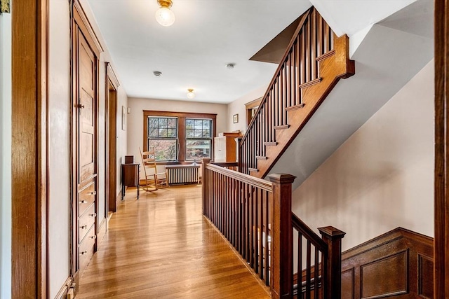 stairs with wood finished floors
