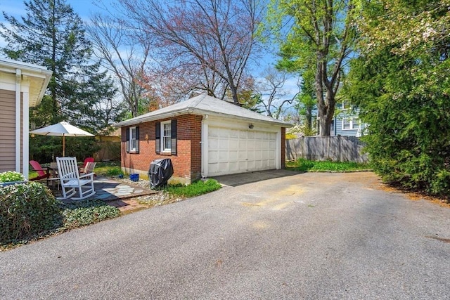 detached garage with fence