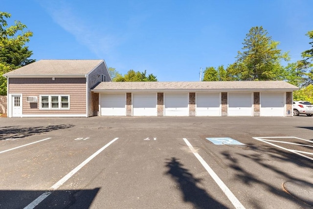 uncovered parking lot featuring community garages