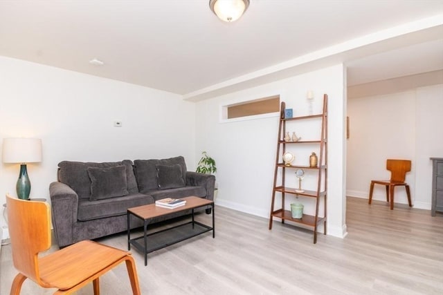 15 Dundee Rd, Quincy, MA 02171 - living area with light wood-style flooring and baseboards