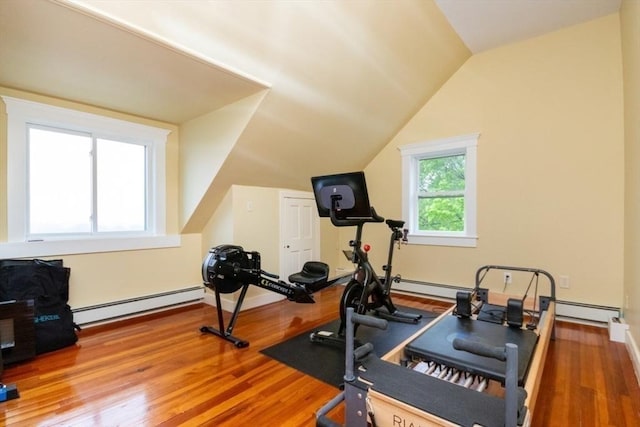 15 Dundee Rd, Quincy, MA 02171 - workout room featuring a baseboard radiator, wood finished floors, vaulted ceiling, and baseboards