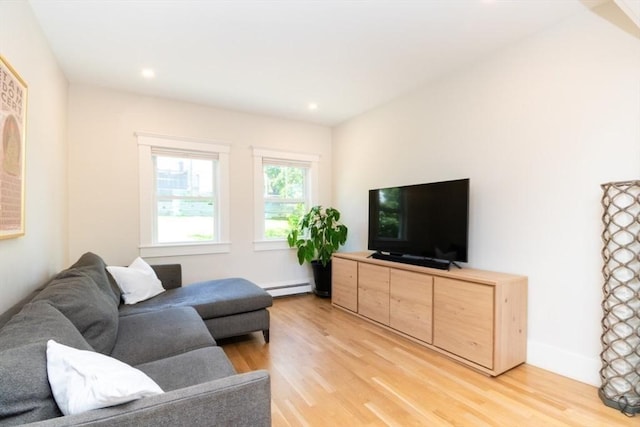 15 Dundee Rd, Quincy, MA 02171 - living area with light wood finished floors, a baseboard heating unit, and recessed lighting