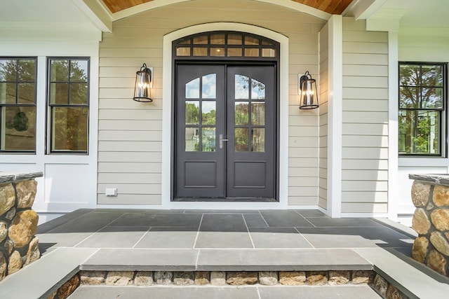 doorway to property with a porch