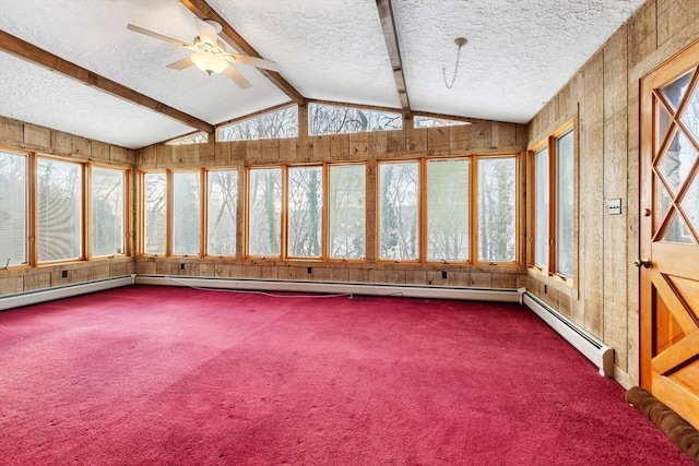 unfurnished sunroom featuring ceiling fan, vaulted ceiling with beams, and a baseboard radiator