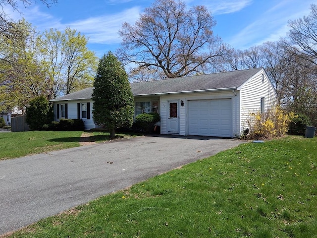 112 Rounseville Ave, Somerset, MA 02726 - ranch-style home featuring a garage, aphalt driveway, a front yard, and a shingled roof