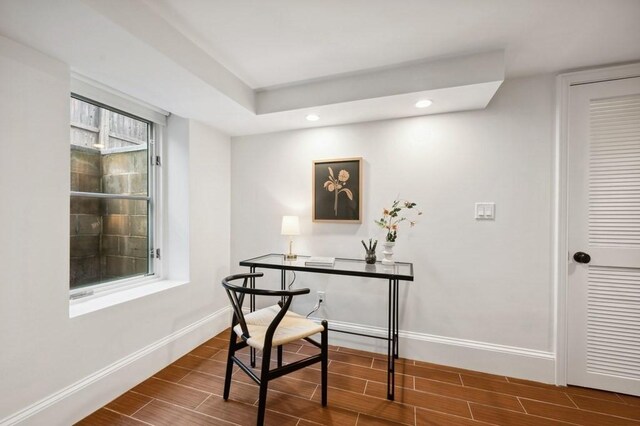 home office featuring wood tiled floor, baseboards, and recessed lighting