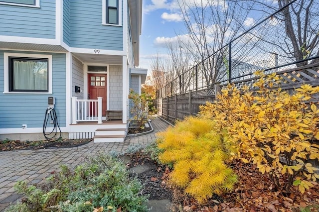 property entrance featuring fence