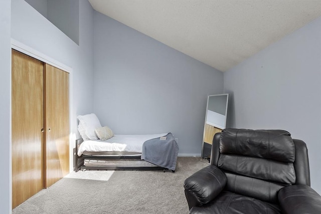 14 Russell Dr Unit 4D, Salem, MA 01970 - carpeted bedroom featuring vaulted ceiling, a closet, and baseboards