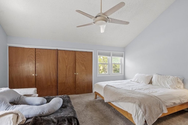 14 Russell Dr Unit 4D, Salem, MA 01970 - bedroom with carpet floors, vaulted ceiling, a closet, a ceiling fan, and a textured ceiling