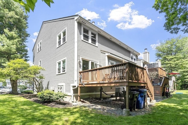 14 Russell Dr Unit 4D, Salem, MA 01970 - rear view of house featuring a yard, a wooden deck, stairs, and central air condition unit