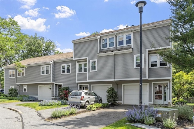 14 Russell Dr Unit 4D, Salem, MA 01970 - view of front of property featuring driveway and a garage