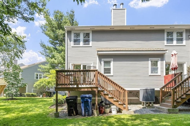 14 Russell Dr Unit 4D, Salem, MA 01970 - rear view of property featuring central AC unit, stairway, a wooden deck, and a yard