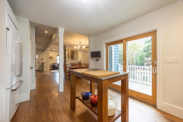 34 Lewis Ave Unit 34, Arlington, MA 02474 - doorway to outside featuring wood finished floors, a chandelier, recessed lighting, and ornate columns