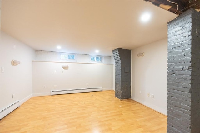 34 Lewis Ave Unit 34, Arlington, MA 02474 - basement featuring baseboard heating and light wood-type flooring