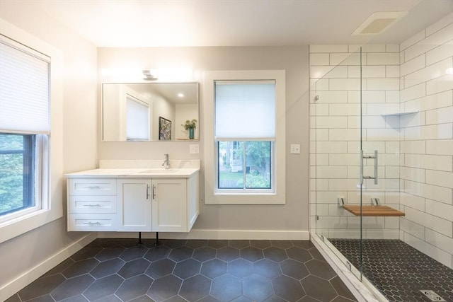 34 Lewis Ave Unit 34, Arlington, MA 02474 - full bath featuring plenty of natural light, vanity, a shower stall, and tile patterned floors