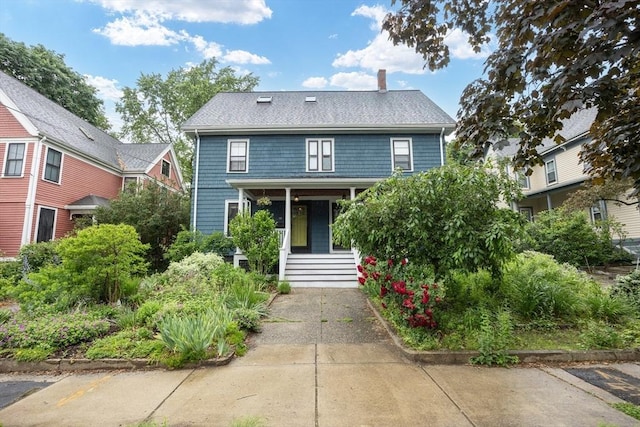 34 Lewis Ave Unit 34, Arlington, MA 02474 - american foursquare style home featuring covered porch and a chimney