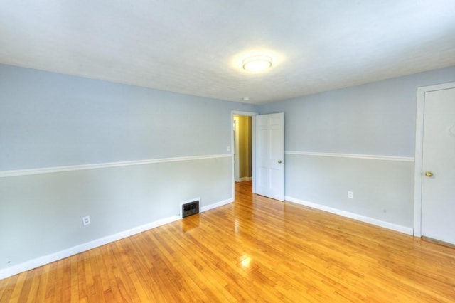 empty room featuring light hardwood / wood-style floors