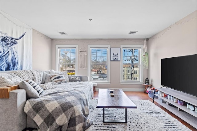living area with wood finished floors