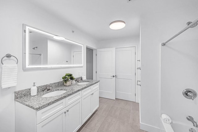 45 Morris St Unit 106, Springfield, MA 01105 - bathroom with double vanity and shower / washtub combination