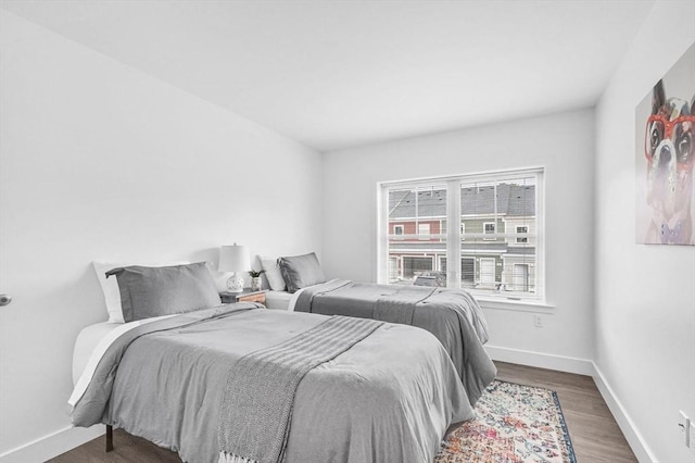 45 Morris St Unit 106, Springfield, MA 01105 - bedroom featuring wood finished floors and baseboards