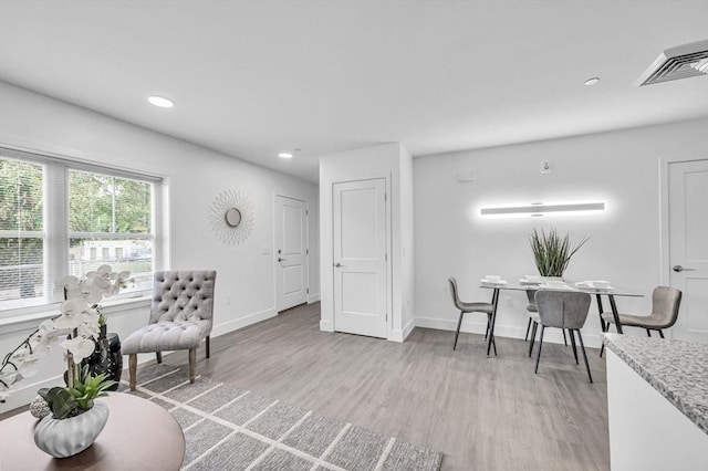 45 Morris St Unit 106, Springfield, MA 01105 - living area featuring light wood finished floors, recessed lighting, and baseboards