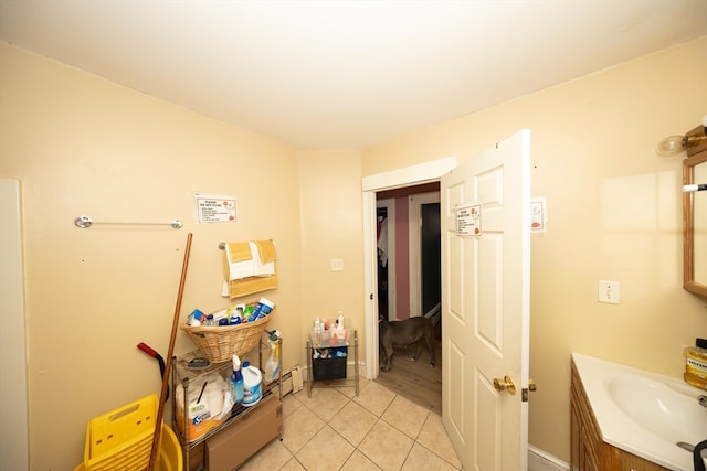 bathroom with vanity and tile patterned floors