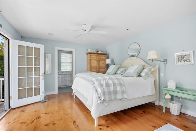 bedroom with access to exterior, multiple windows, ceiling fan, and light hardwood / wood-style flooring