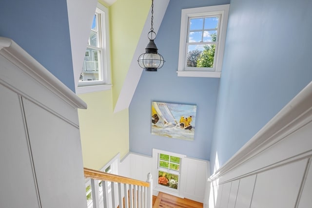 staircase featuring hardwood / wood-style floors