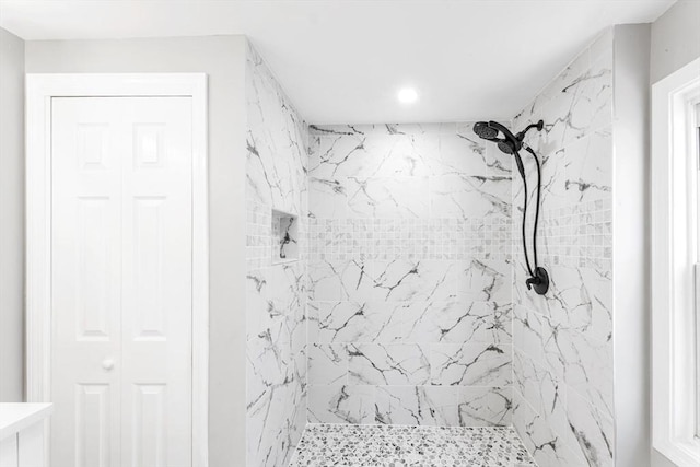 full bathroom featuring a shower stall