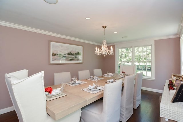 dining room featuring baseboards, a chandelier, ornamental molding, and dark wood finished floors