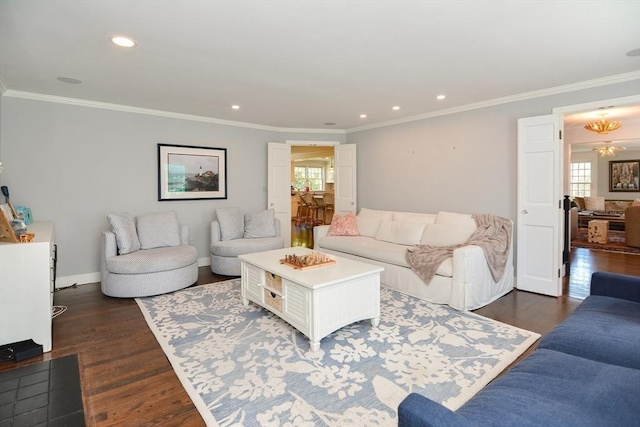 living area with crown molding, dark wood-style flooring, recessed lighting, and a wealth of natural light