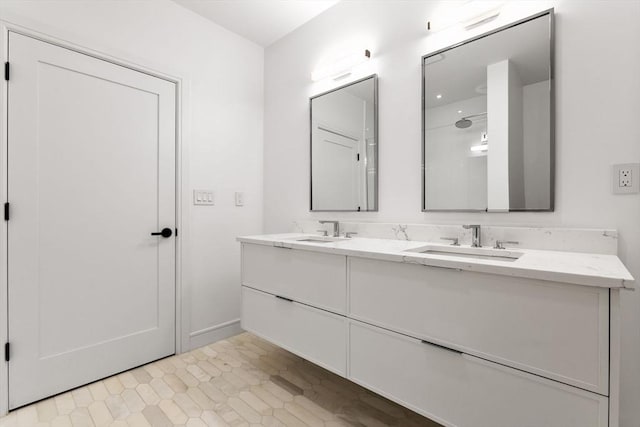 full bath with double vanity and a sink